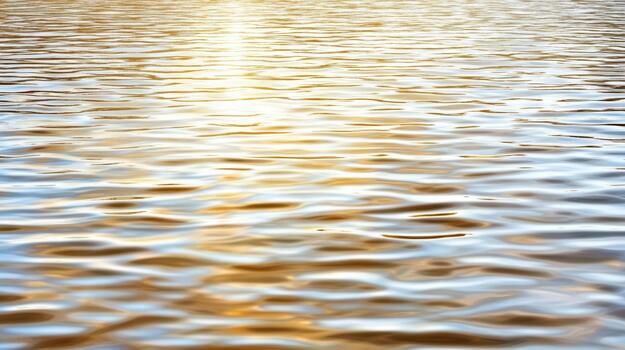 Golden smooth water surface with soft reflection and gentle ripples photo