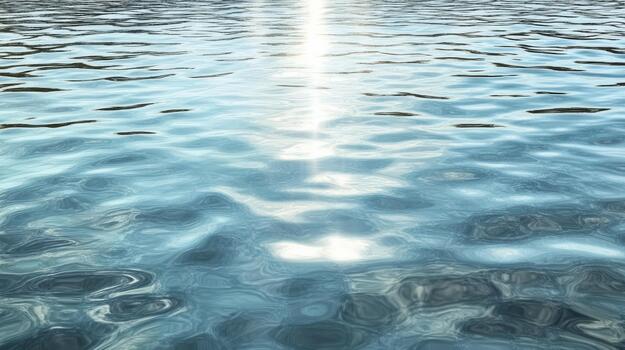 Shimmering sun reflection on calm blue water creating peaceful mood photo