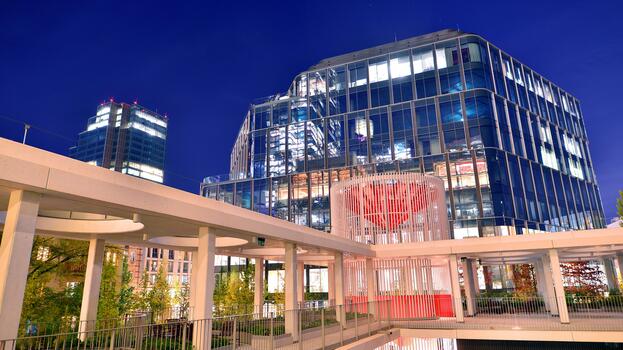 a large building with a clock photo