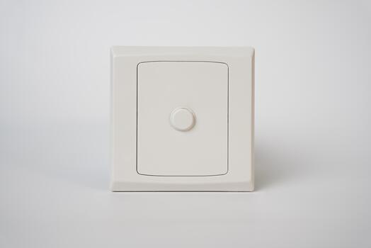 Minimalist photo of a small white safe with a circular dial lock on a light background, symbolizing security, protection, and privacy. Perfect for financial or data safety concepts.