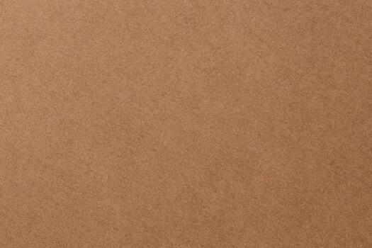 Craft Paper Surface with Grainy Texture and Earth Color Macro View photo