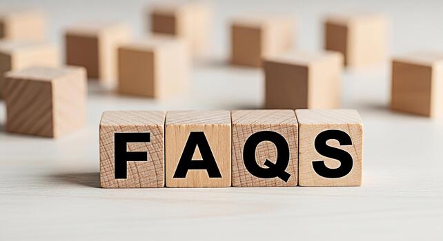 Wooden blocks spelling FAQs on a bright wooden surface representing common inquiries and information access creating a clear and helpful atmosphere for customer support and knowledge sharing photo