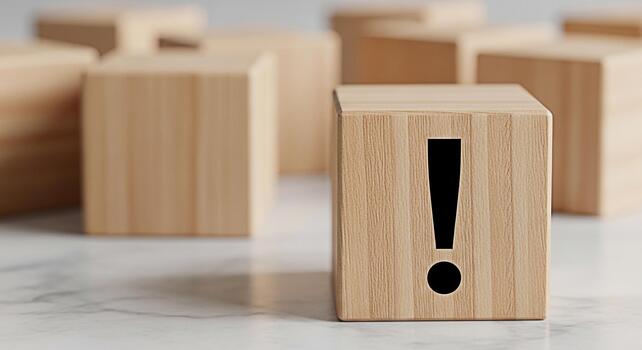 Wooden block displaying an exclamation point on a marble surface symbolizing attention and warning in a minimalist and clean environment conveying a sense of urgency and importance photo