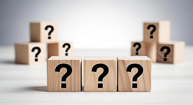 Wooden blocks displaying question marks on a white surface representing uncertainty and the need for answers in a bright minimalist setting symbolizing problemsolving and decisionmaking photo