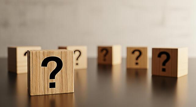 Wooden blocks with question marks scattered on a dark reflective surface symbolizing confusion problemsolving and the search for answers in business and lifes challenges photo