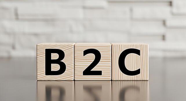 Wooden blocks displaying B2C on a reflective surface against a white brick wall symbolizing businesstoconsumer relationships and strategies creating a clean and professional atmosphere photo