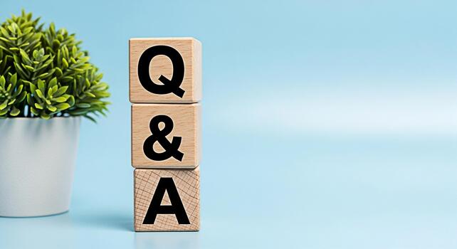 Wooden blocks displaying Q A on a light blue background symbolizing information exchange and knowledge sharing creating a calm and professional atmosphere for business and educational purposes photo