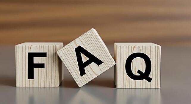 Wooden blocks spelling FAQ on a reflective surface symbolizing frequently asked questions providing answers and support in a simple and clear way fostering understanding and customer satisfaction photo