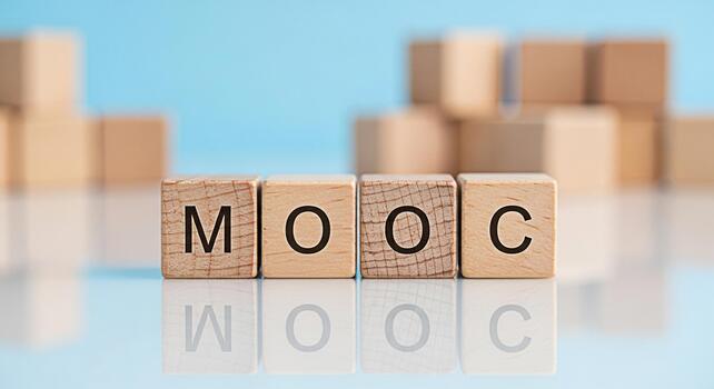 Wooden blocks spelling MOOC on a reflective surface against a blue background representing online education and elearning conveying a message of accessibility and modern learning methods photo