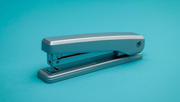 Metallic Device on Azure Surface Gleaming Reflections and Linear Geometry. photo