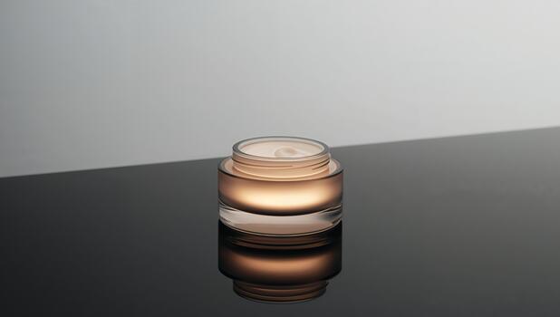 Gleaming Container on a Reflective Surface. A Study in Light and Form, Minimalist Composition. photo