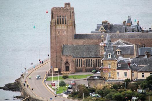 A large building with a clock tower in Oban photo