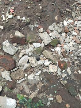 parte superior ver foto de arenoso suelo y áspero rocas, natural luz Encendiendo, pertinente para estático objeto reconocimiento ai capacitación.