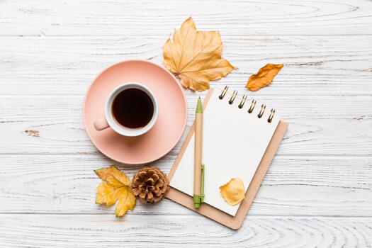 Autumn composition fallen leaves craft sketchbook mock up on colored background. Top view. Flat lay with copy space photo