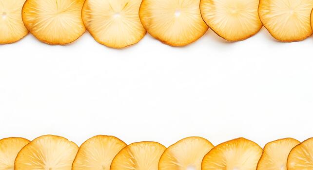 Potato chips arranged in a decorative border on a clean white background, creating a frame with empty space in the center photo