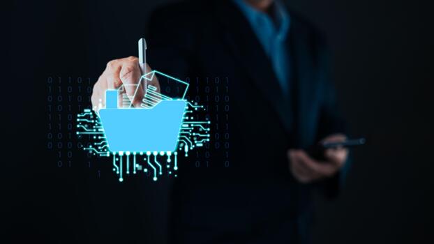 businessman uses a stylus and smartphone with a glowing digital folder interface, symbol document management, digital storage, cloud organization, electronic files, and secure data access technology. photo