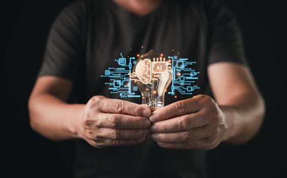 person hold glowing light bulb with holographic AI brain and circuit icons, symbolizing artificial intelligence, innovation, smart technology, creative thinking, and futuristic digital transformation. photo