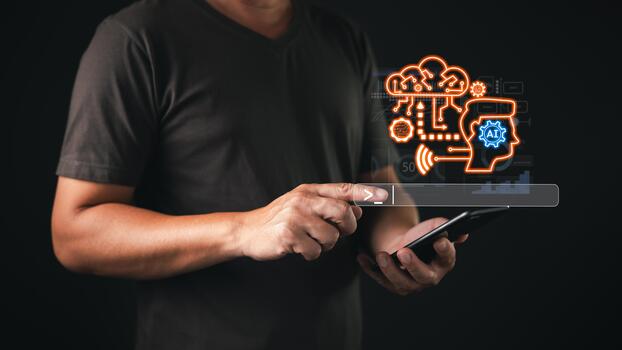 A businessman interacts with a futuristic AI chatbot powered content creation interface, symbolizing the concept of artificial intelligence and its integration with human thought. photo