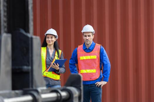 Professional Logistic Manager Team Standing Confidently in Front of Cargo, Industrial Engineers and Supervisors Ready for Inspection at Container Port photo