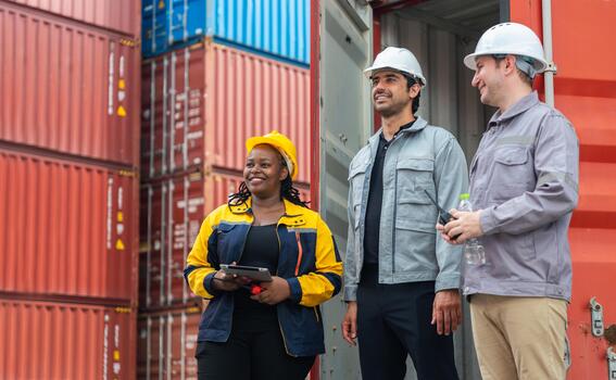 Logistics Team Discussion and Inspection at Container Port Terminal, Professional Engineer and Worker Group Talk at Shipping Cargo Depot, Workers with Tablet Stand near Container Stack photo