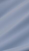 mild djup blå strömmande tyg skapa slät elegant yta subtil rörelse mjuk vika ihop minimal textur lugn visuell harmoni modern abstrakt bakgrund symboliserar lugna mjukhet renhet lugna design form video
