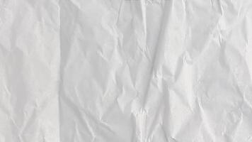arrugado papel detener movimiento animación fondo, realista arrugado doblada papel textura, hecho a mano orgánico superficie movimiento para retro arte estilo efectos visuales, movimiento gráficos, y creativo diseño elementos video