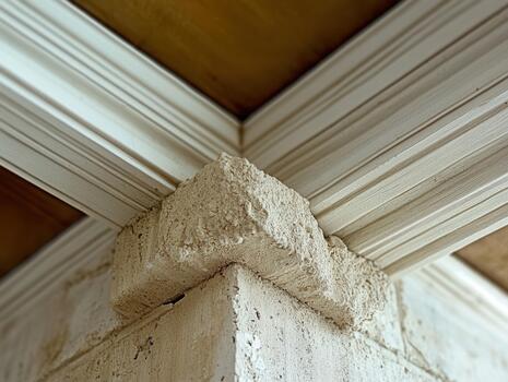Close-up view of a minimalist ceiling joint showcasing detailed craftsmanship and design elements in a serene indoor setting photo