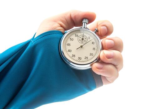 The hand with a mechanical analog stopwatch on a white background. Time part precision. Measurement of the speed interval photo