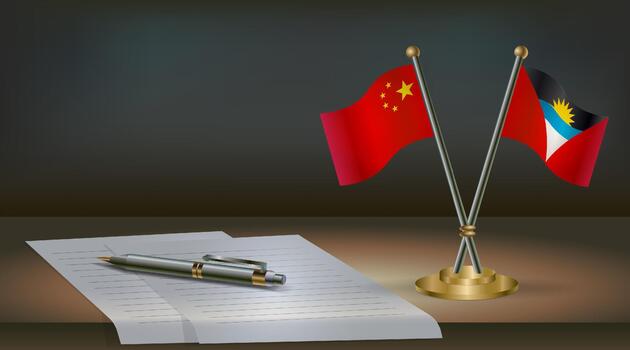 China and Antigua and Barbuda flags on table in office. International relations on a dark gradient color background. vector