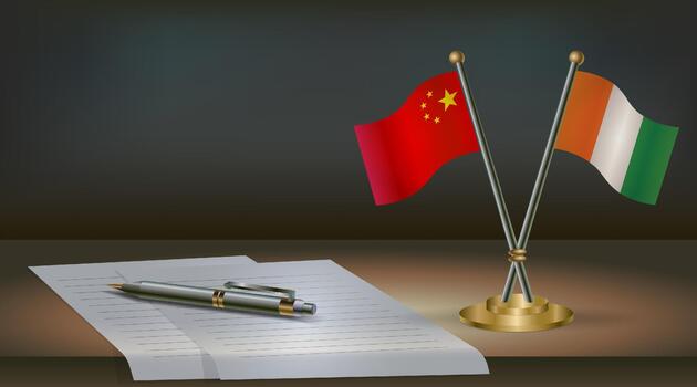 China and Cote D'Ivoire flags on table in office. International relations on a dark gradient color background. vector