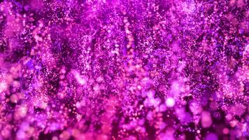 Abstract particles of purple and pink glitter rise upward, creating a bokeh effect. A beautiful background of sparkling dust particles. video