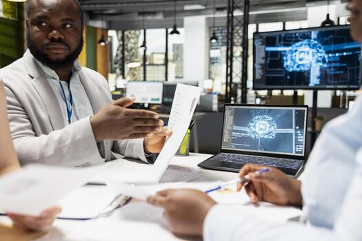 Diverse HR employees using AI neural networks to scan resumes to choose the right candidate through machine learning recruitment process for post interview evaluation tools. Chatbot technology. photo