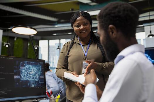 alegre gerente dando papeleo a contable en oficina a revisión utilizando ai asistente para apoyo. alegre equipo líder y contador utilizando llm chatbot a automatizar contabilidad Tareas foto