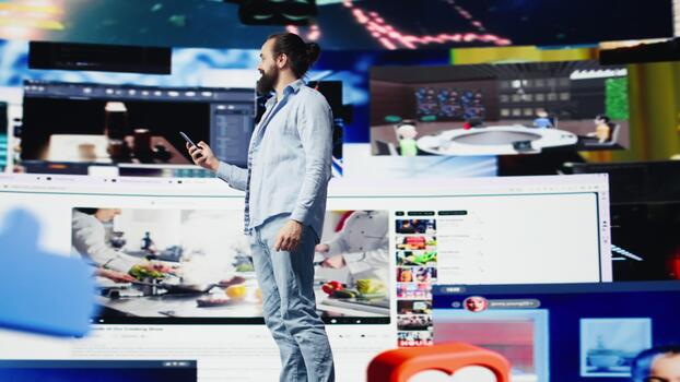 High tech web lifestyle of an internet user checking real time notifications, enjoying interaction with followers and posting creative content in a modern social network connection. Camera B. photo