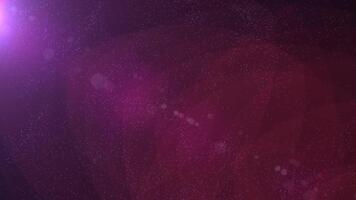abstract donker Purper kosmisch achtergrond met gloeiend deeltjes en zacht lens gloed. magisch drijvend stof of diep ruimte nevel bedekking lus video