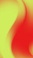 Abstract swirling patterns of vibrant yellow and red colors creating a dynamic visual effect video
