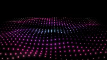 champ de néon points formes une écoulement vague de rose et violet lumière à travers une foncé surface. science-fiction particule Contexte de micromonde ou espace avec lumière effets. sans couture boucle 4k video