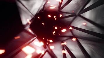 abstrato futurista Sombrio túnel com triangular padronizar e brilhando vermelho partículas video