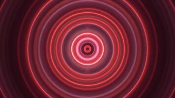 hipnótico rojo neón círculos pulsante y en expansión en un oscuro resumen antecedentes bucle. video