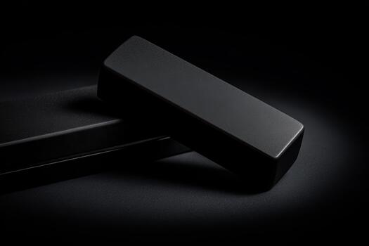 negro rectangular objetos metido en un oscuro superficie foto