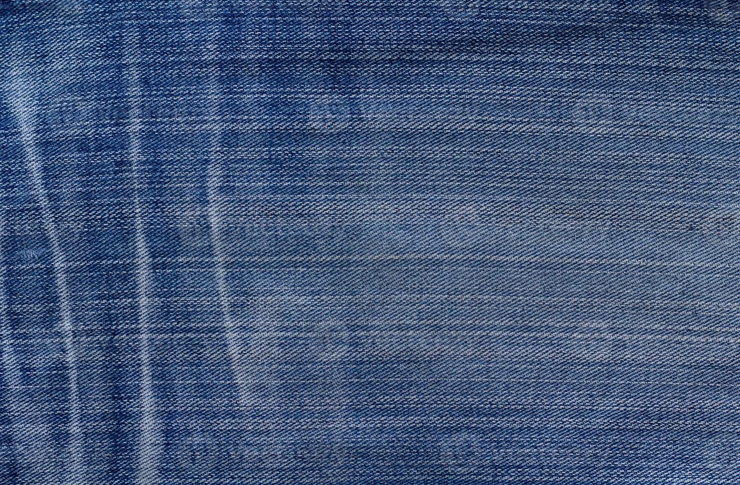 fondo di struttura del denim dei jeans blu foto