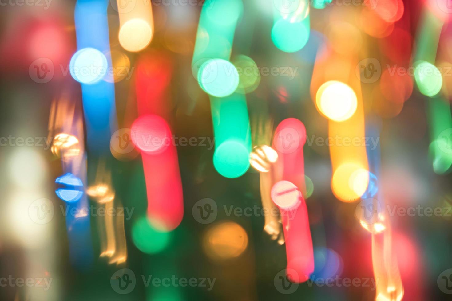 priorità bassa astratta di struttura burred del movimento colorato del bokeh. lunga esposizione di piccole luci al neon foto