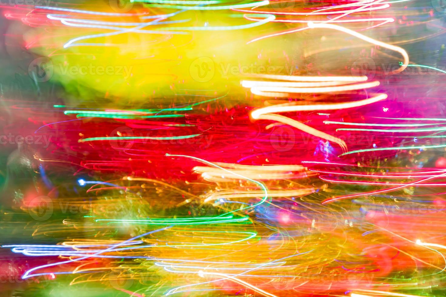 bokeh multicolore luminoso in movimento sfocatura dello sfondo foto