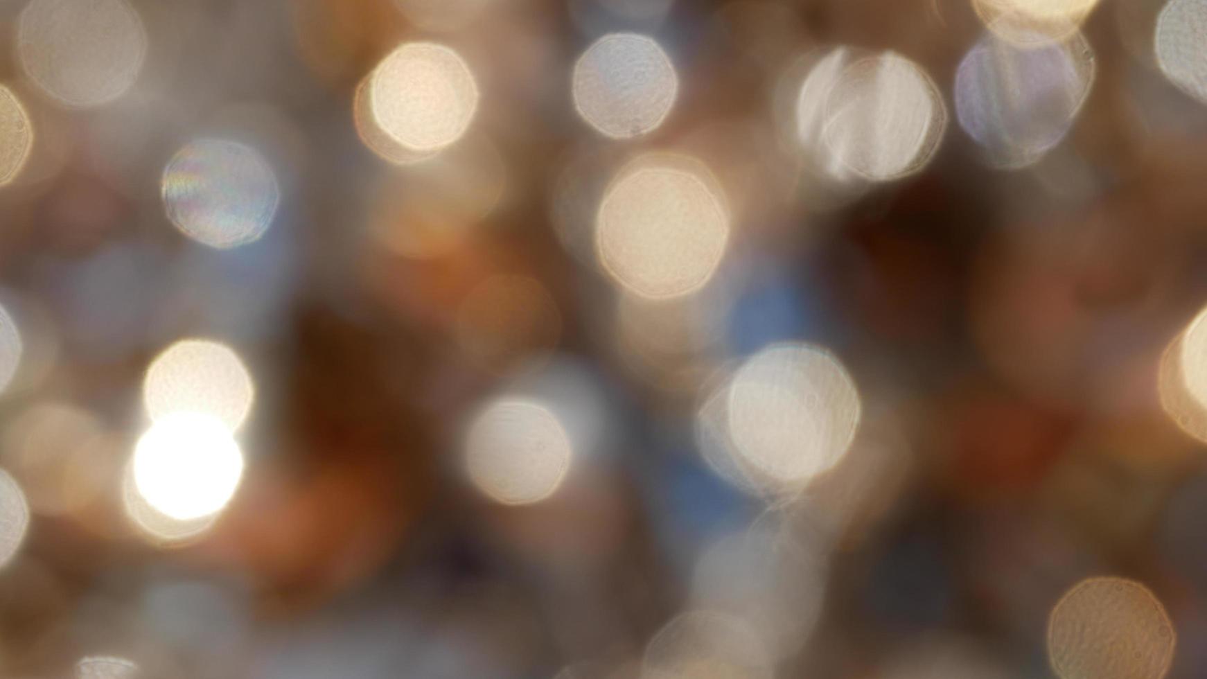 gli sfondi bokeh sono pieni di colore e glamour come una celebrazione. adatto per sfondo pubblicitario. foto