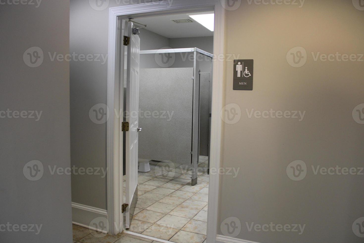 uomini toilette cartello interno inossidabile foto