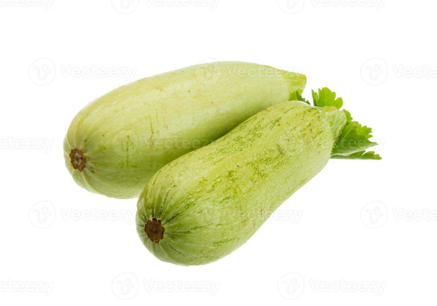 zucchine su sfondo bianco foto