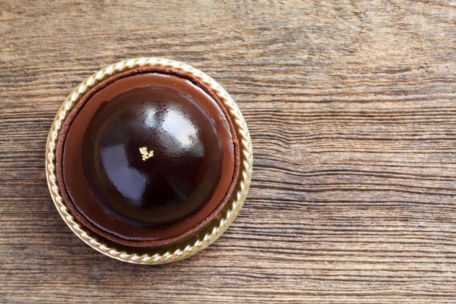 cioccolato torta su di legno foto