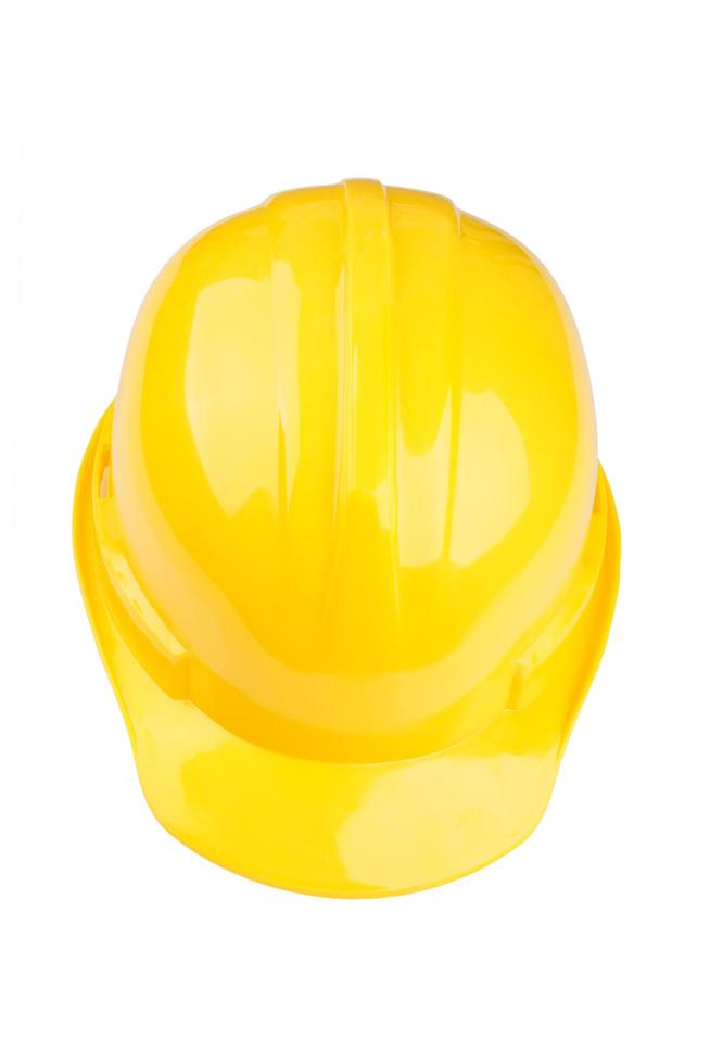 casco di sicurezza giallo su sfondo bianco foto