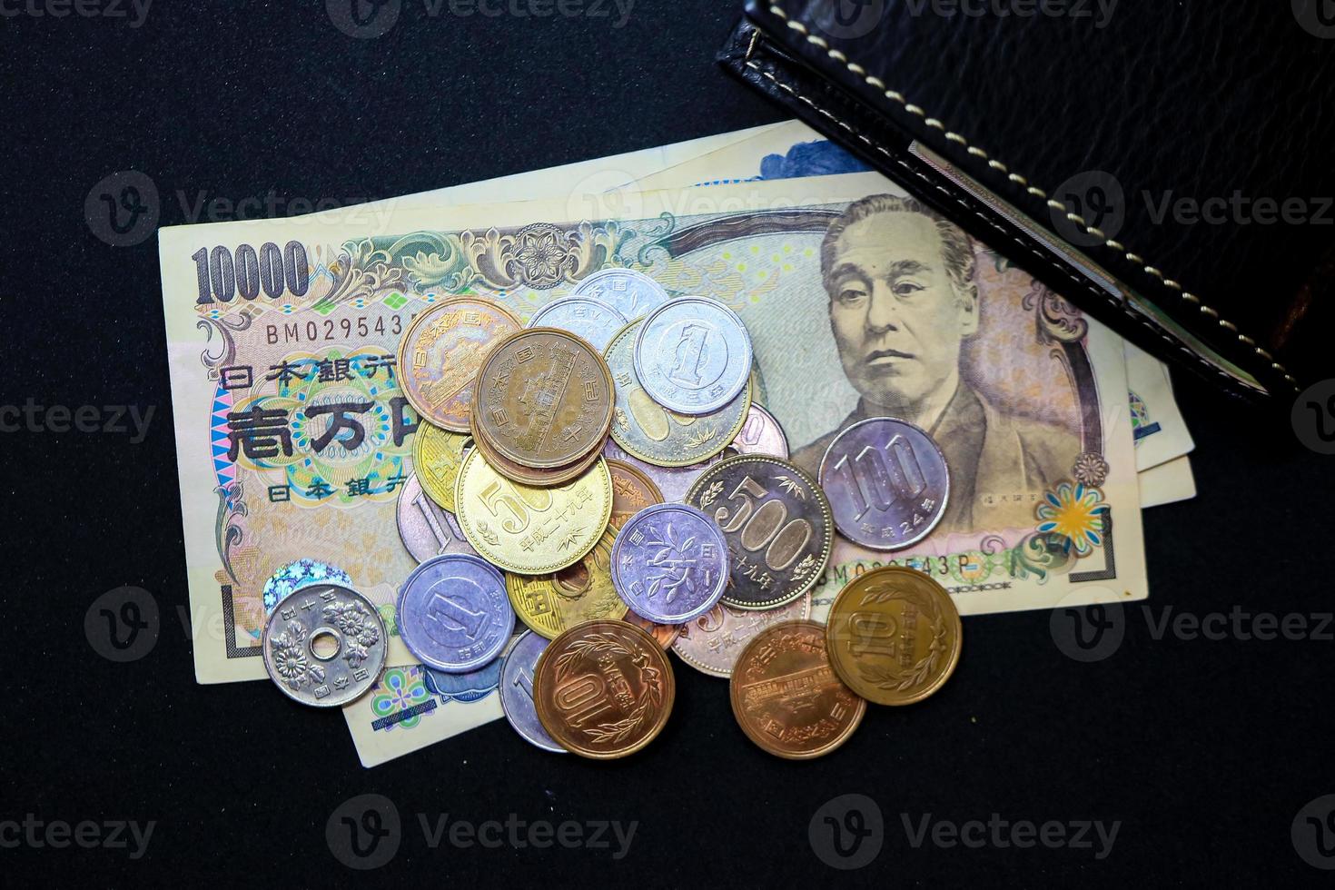 giapponese yen, moneta, i soldi foto