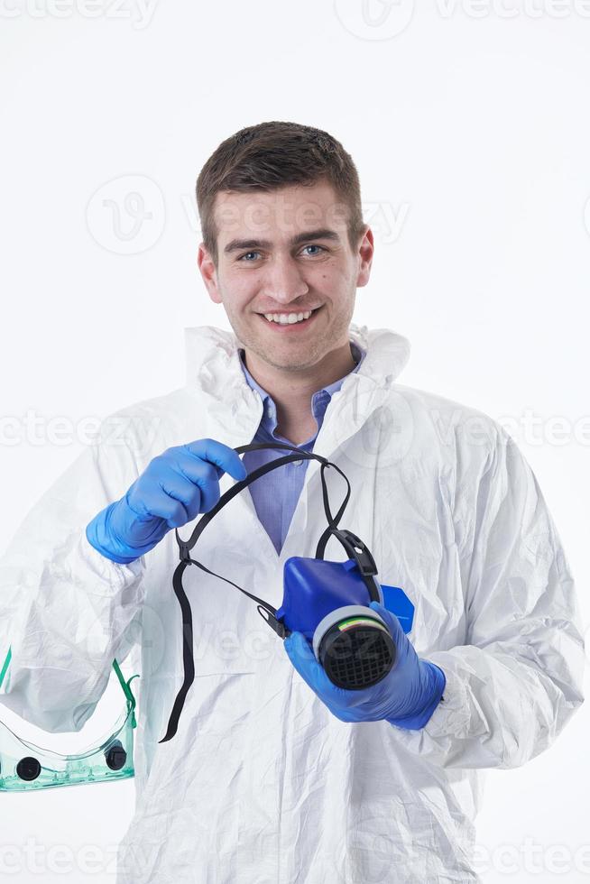 medico indossare protettivo biologico completo da uomo e maschera dovuto per coronavirus bianca sfondo foto